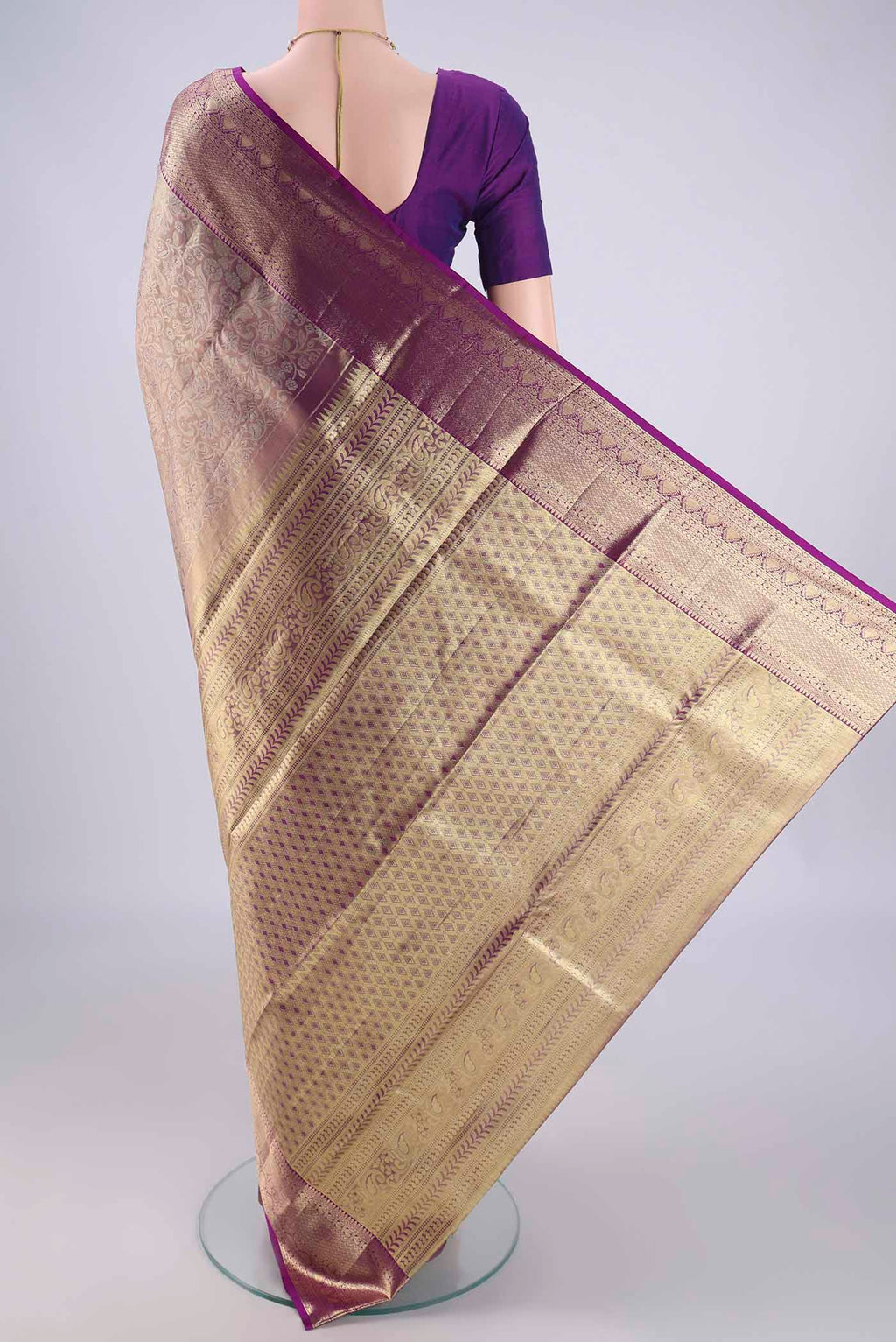 Flat view of Golden Kanjivaram Silk Saree with Zari Brocade on the body and Zari Border. 