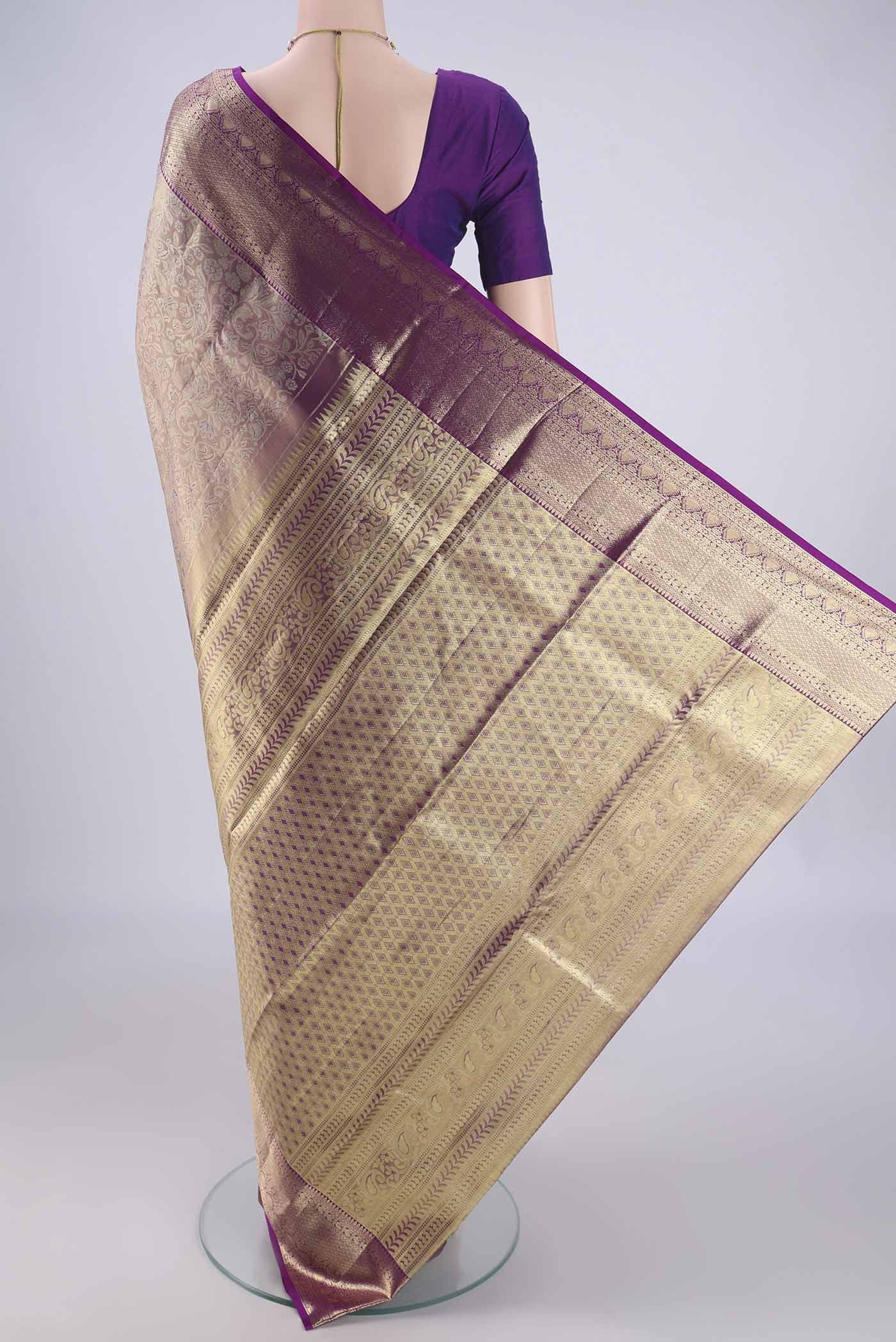 Flat view of Golden Kanjivaram Silk Saree with Zari Brocade on the body and Zari Border. 