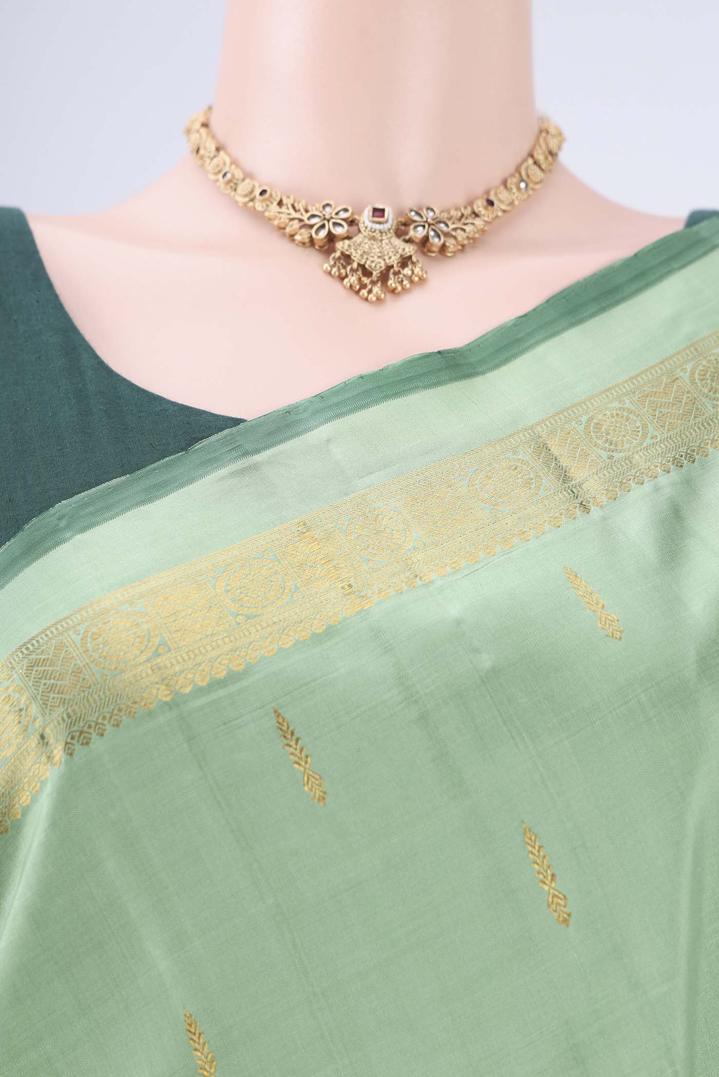 Border image of Light Green Kanchipuram Silk Saree with Zari Butta on the body and Zari Border. 