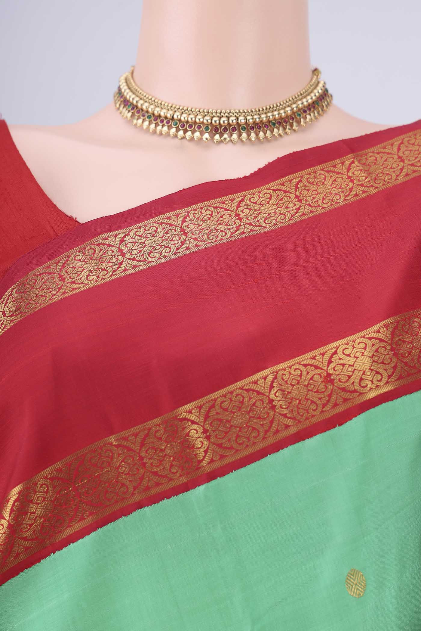 Border image of Green Dual Tone Kanjivaram Silk Saree with Zari Butta on the body and Zari Border. 