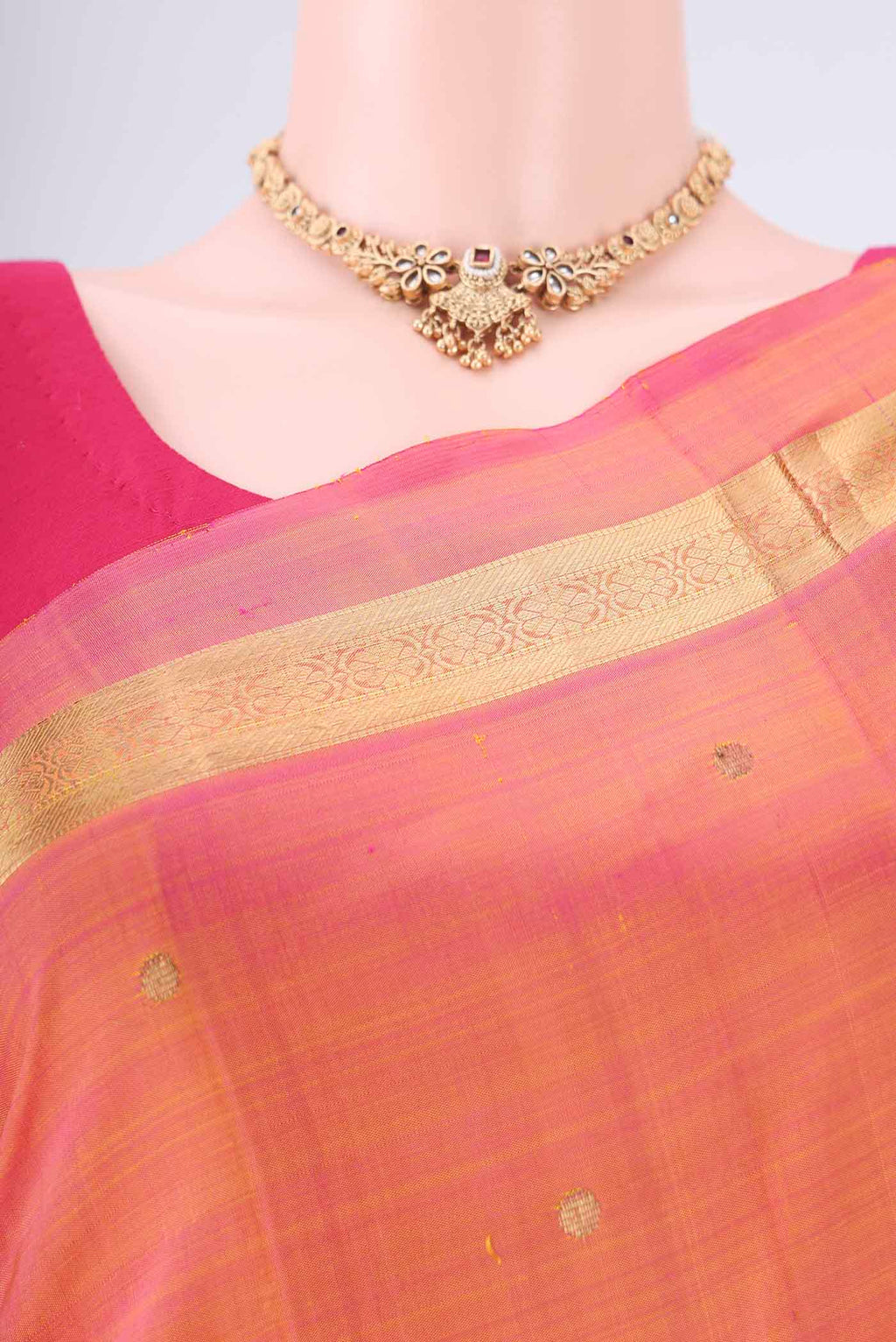 Border image of Pinkish Yellow Kanjivaram Silk Saree with Zari Butta on the body and Zari Border. 