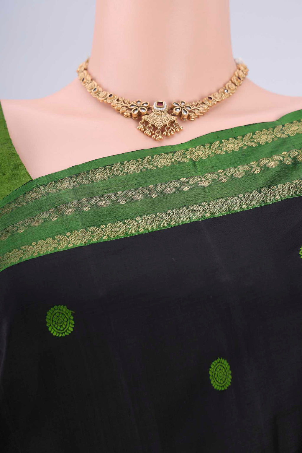 Border image of Black Dual Tone Kanchipuram Silk Saree with Thread Butta on the body and Zari Border. 