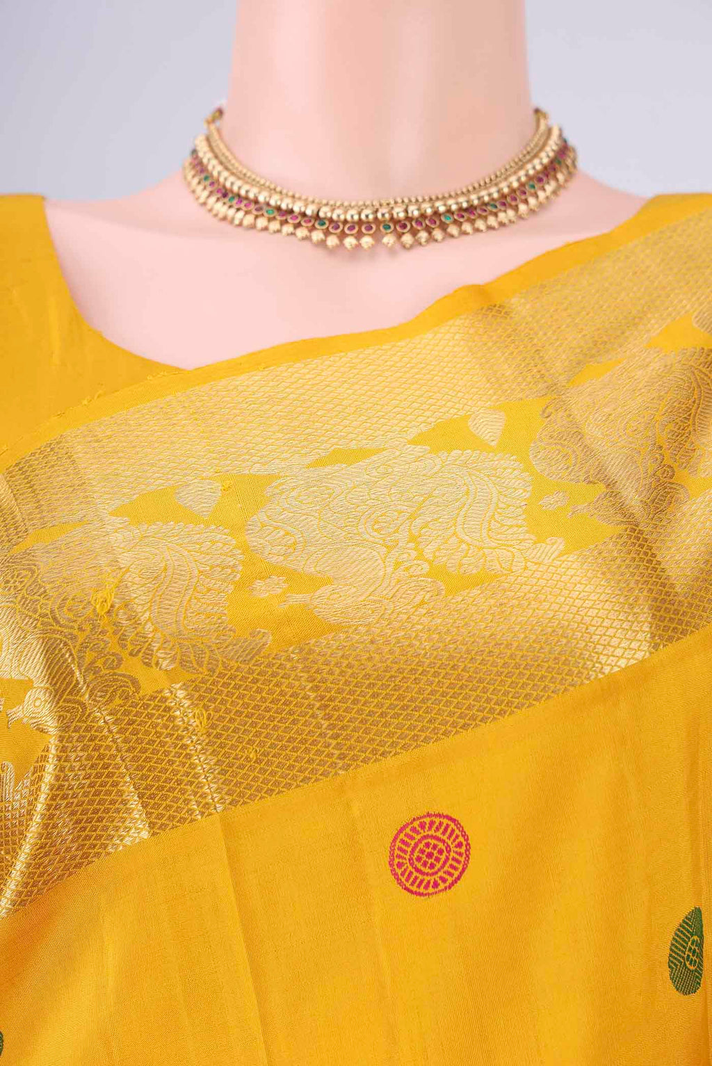Border image of Mustard Dual Tone Kanjivaram Silk Saree with Thread Butta on the body and Zari Border. 