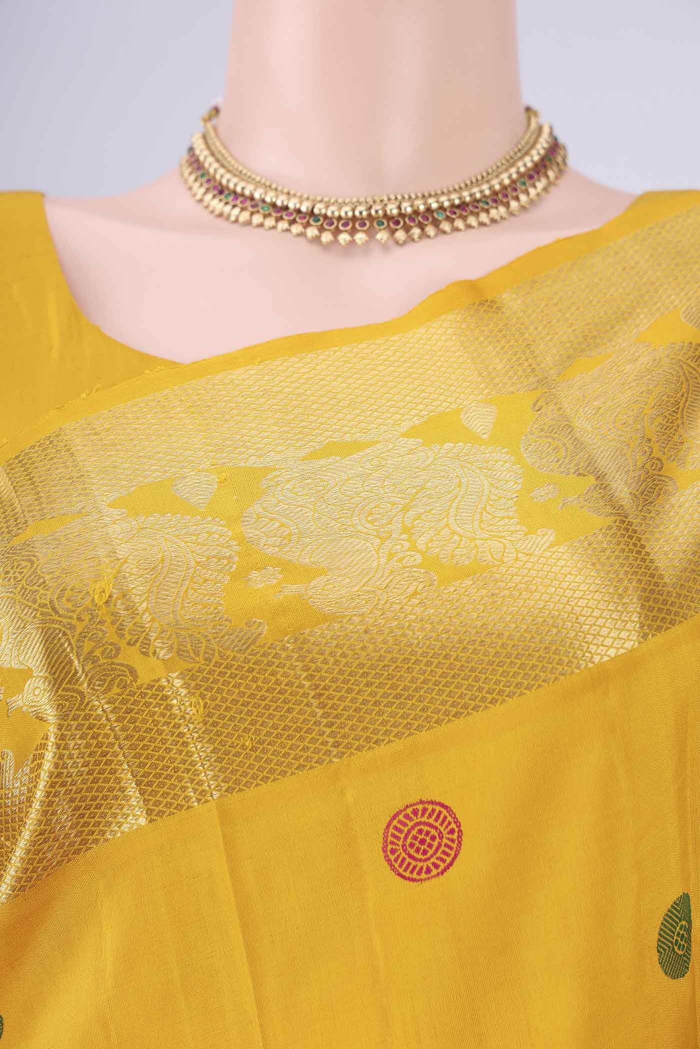 Border image of Mustard Dual Tone Kanjivaram Silk Saree with Thread Butta on the body and Zari Border. 