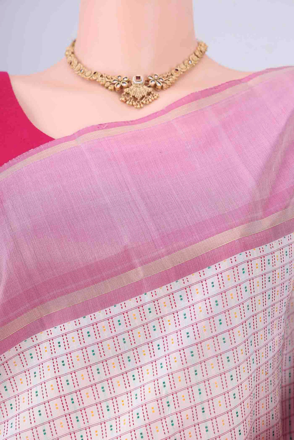 Border image of Off White Kanchipuram Silk Saree with Checked design on the body and Zari Border. 