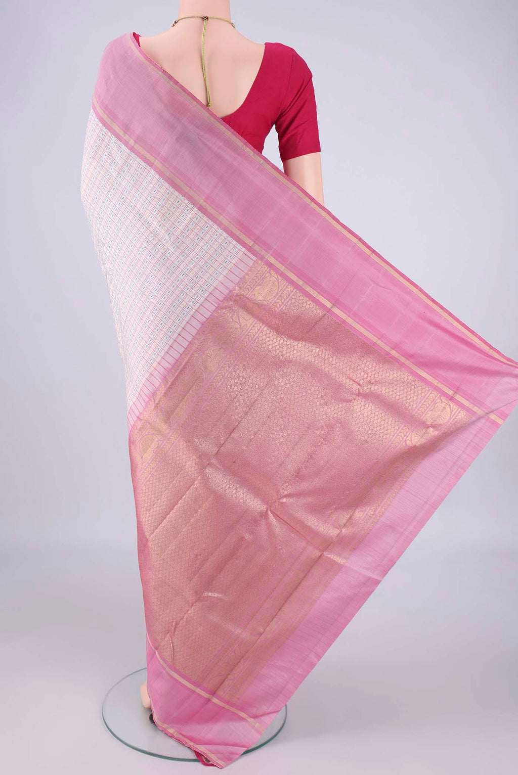 Flat view of Off White Kanchipuram Silk Saree with Checked design on the body and Zari Border. 