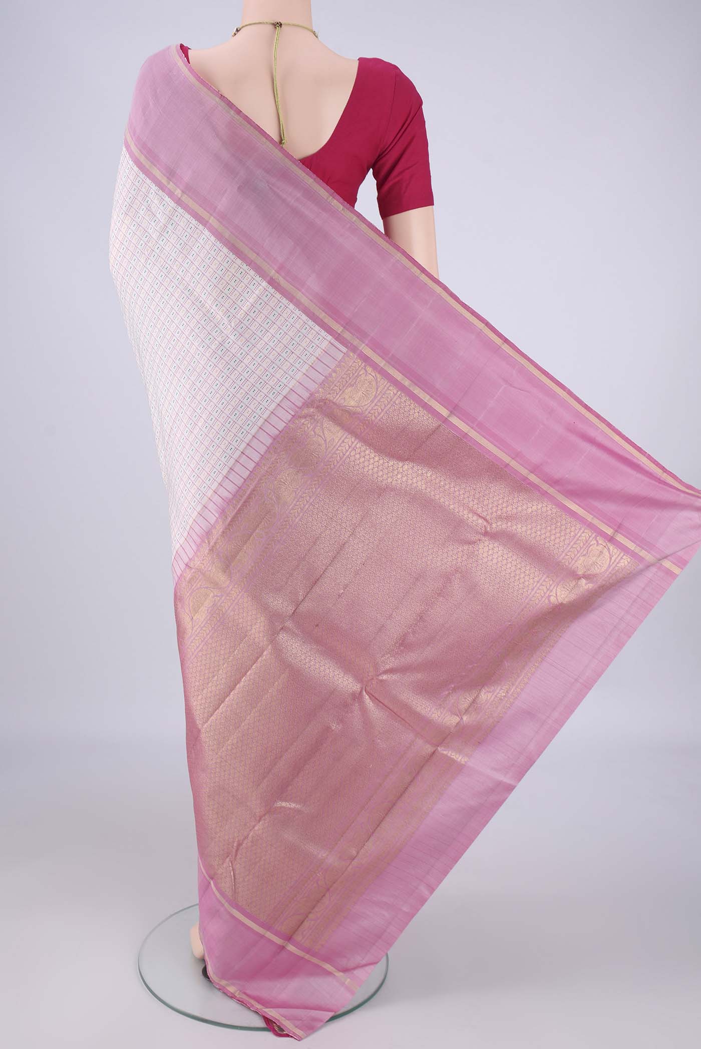 Flat view of Off White Kanchipuram Silk Saree with Checked design on the body and Zari Border. 