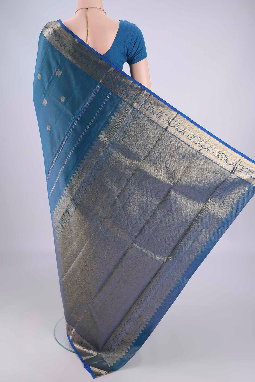 Flat view of Blue Kanjivaram Silk Saree with Zari Brocade on the body and Zari Border. 