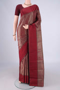 Maroon Kanjivaram Silk Saree with Zari Brocade on the body and Zari Border.  displayed on a mannequin