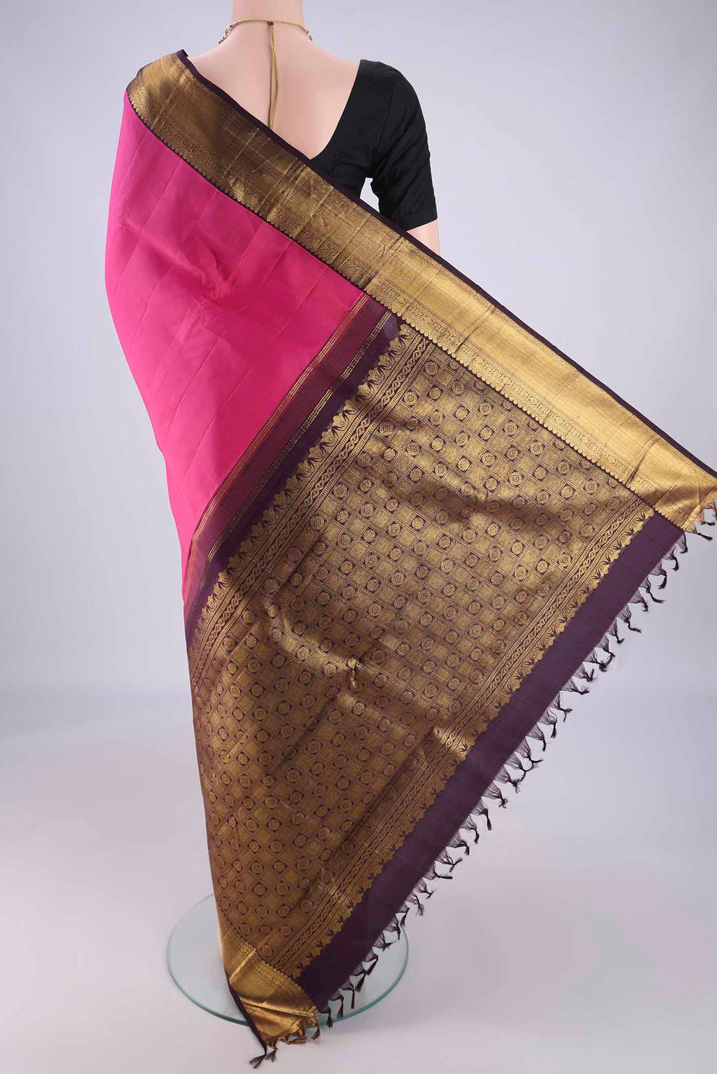 Flat view of Pink Dual Tone Kanjivaram Silk Saree with Plain Body and Zari Border. 