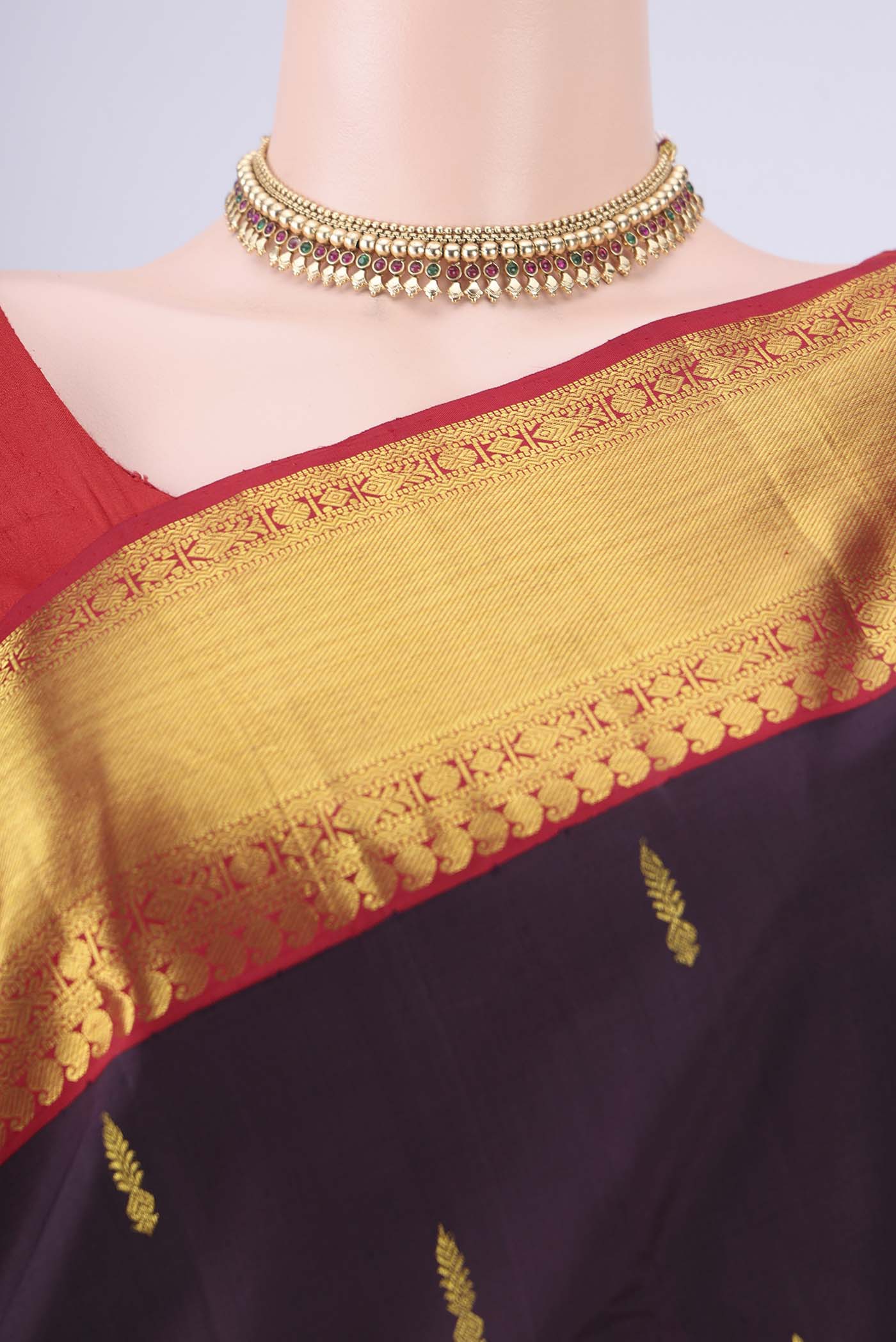 Border image of Brown Dual Tone Kanjivaram Silk Saree with Zari Butta on the body and Zari Border. 