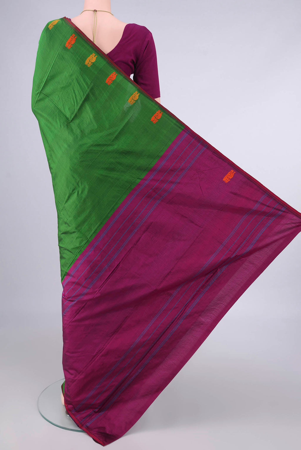 Flat view of Pure Silk Green Kanchipuram Saree with Plain Body and Zari And Thread Border. 