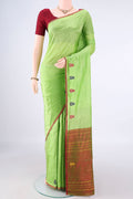 Pure Silk Light Green Kanchipuram Saree with Plain Body and Thread Border.  displayed on a mannequin