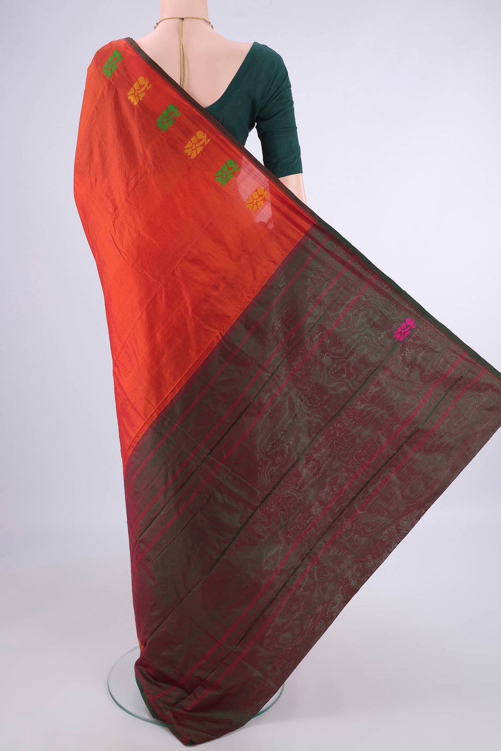 Flat view of Orange Kanchipuram Silk Saree with Plain Body and Thread Border. 