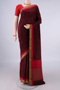Maroon Mysore Crepe Saree with Printed design on the body and Zari Border.  displayed on a mannequin