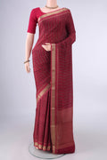 Coral Mysore Crepe Saree with Printed design on the body and Printed Border.  displayed on a mannequin