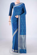 Blue Dual Tone Banarasi Katan Silk Saree with Thread Butta on the body and Thread Border.  displayed on a mannequin
