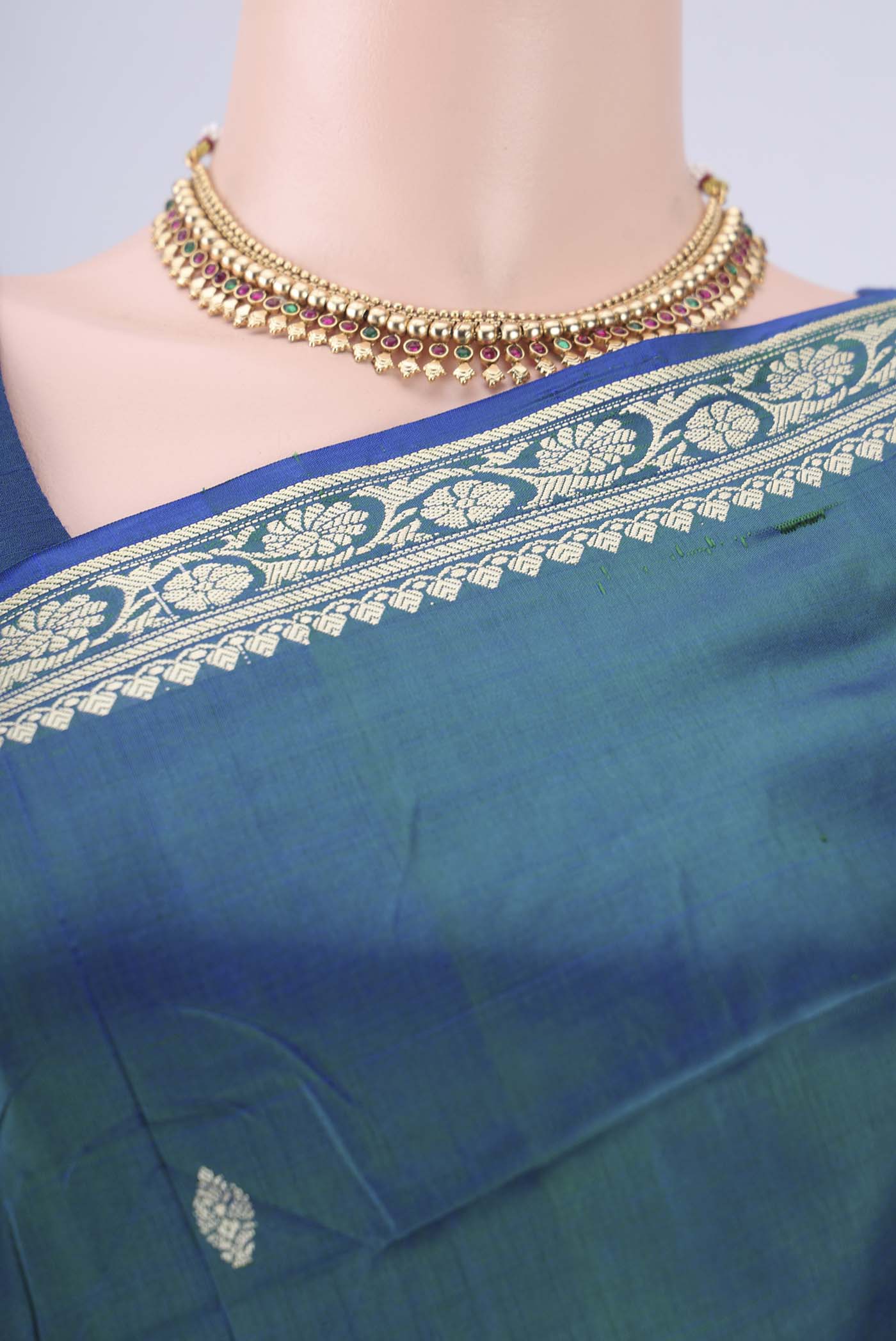 Border image of Peacock Blue Banarasi Silk Saree with Thread Butta on the body and Thread Border. 