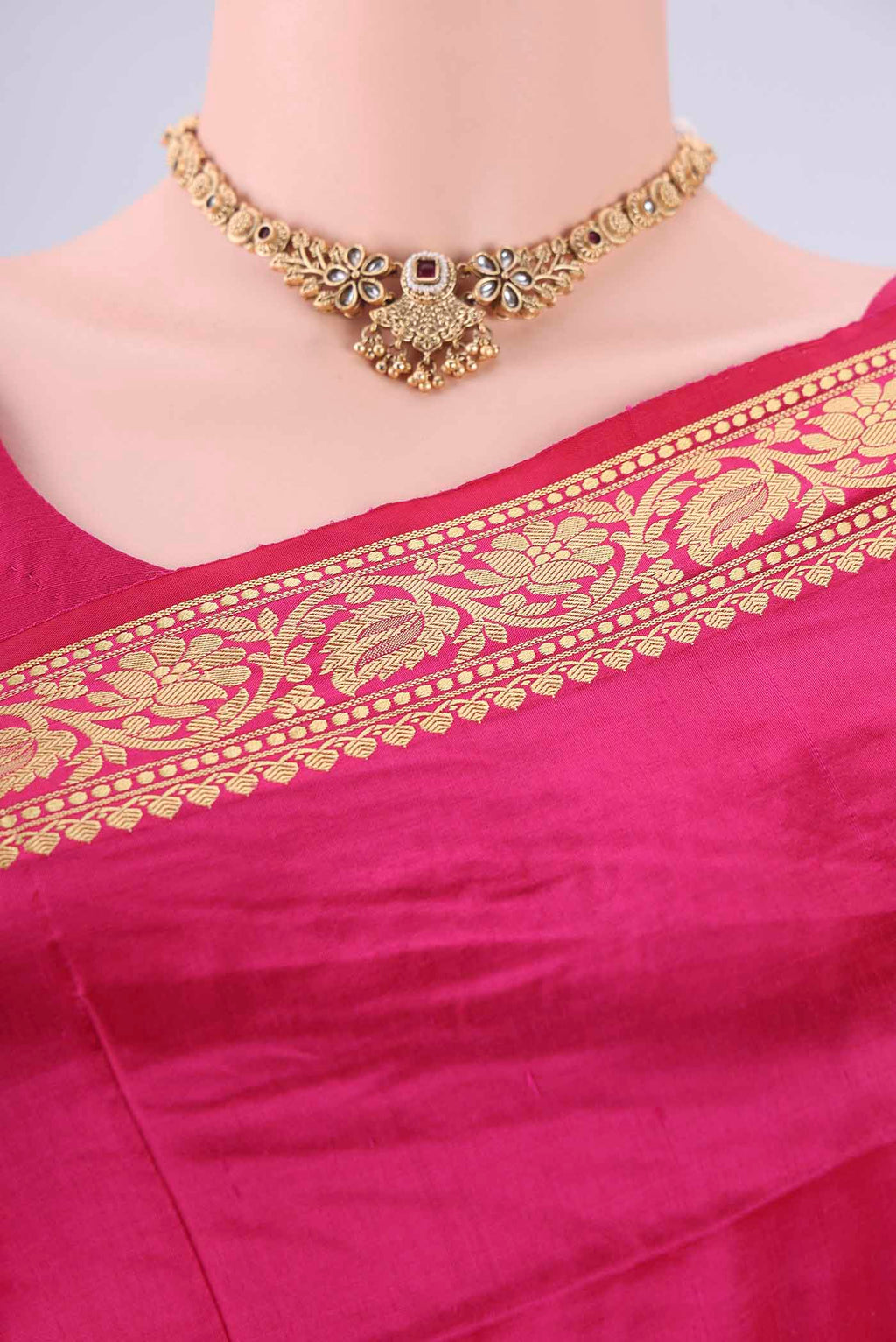 Border image of Rani Pink Banarasi Katan Silk Saree with Thread Butta on the body and Thread Border. 