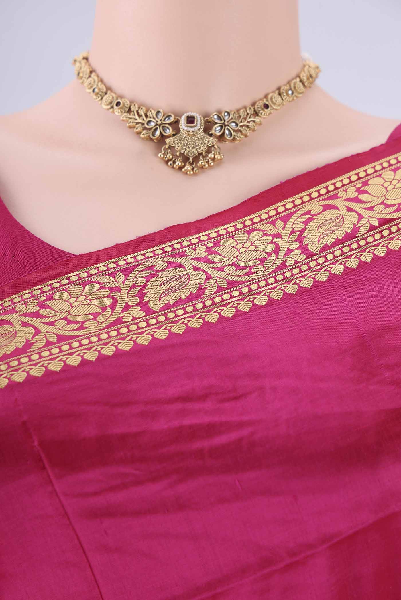 Border image of Rani Pink Banarasi Katan Silk Saree with Thread Butta on the body and Thread Border. 