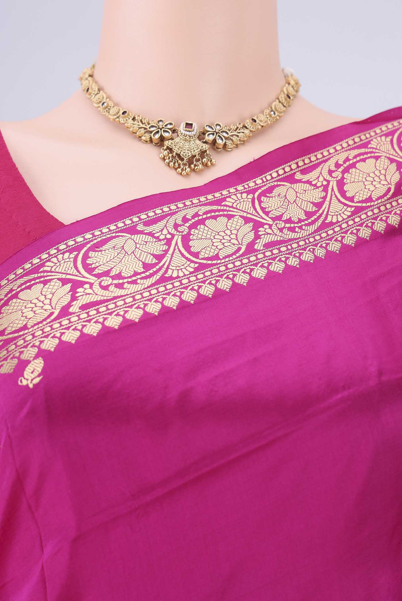 Border image of Rani Pink Banarasi Silk Saree with Thread Butta on the body and Thread Border. 