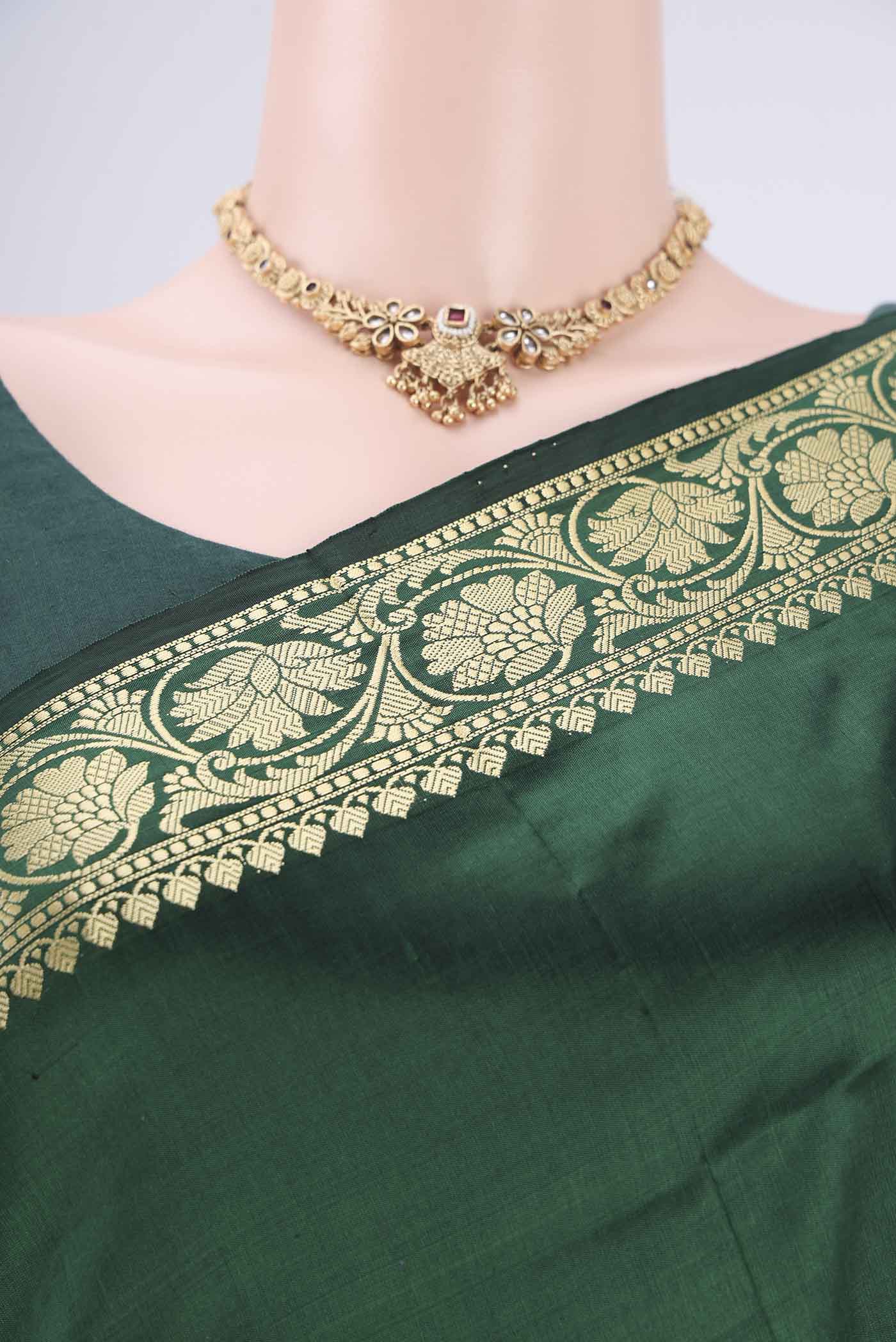 Border image of Bottle Green Banarasi Katan Silk Saree with Thread Butta on the body and Thread Border. 