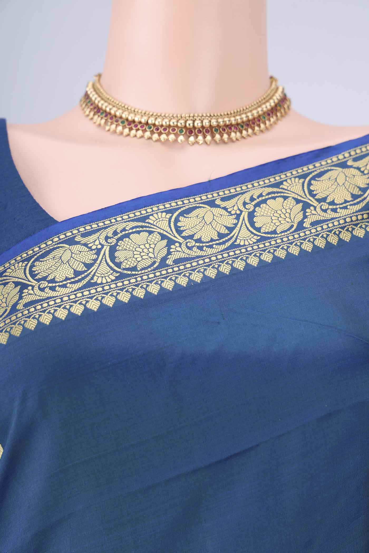 Border image of Peacock Blue Dual Tone Banarasi Katan Silk Saree with Thread Butta on the body and Thread Border. 