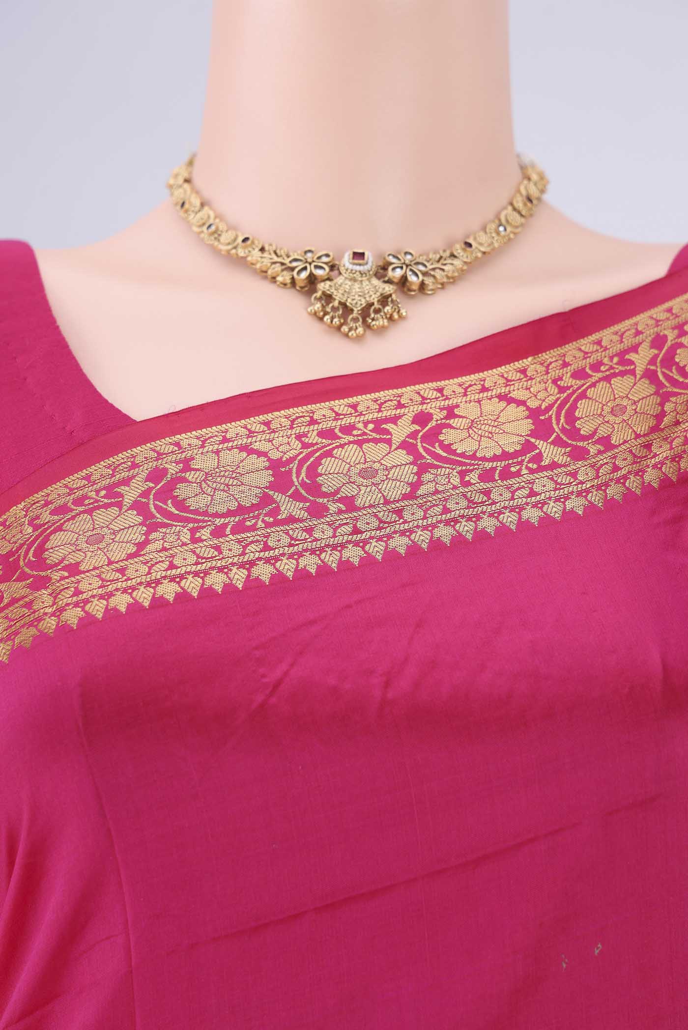 Border image of Rani Pink Banarasi Silk Saree with Thread Butta on the body and Thread Border. 