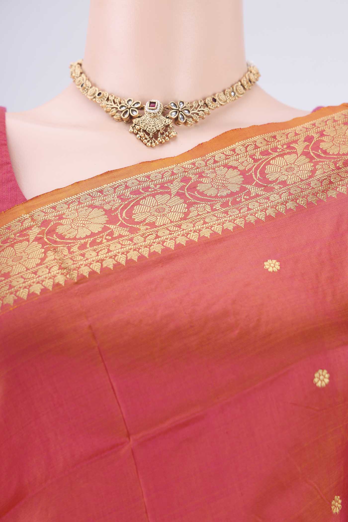 Border image of Brick Orange Banarasi Katan Silk Saree with Thread Butta on the body and Thread Border. 