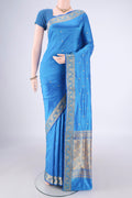 Blue Dual Tone Banarasi Katan Silk Saree with Zari Butta on the body and Zari Border.  displayed on a mannequin