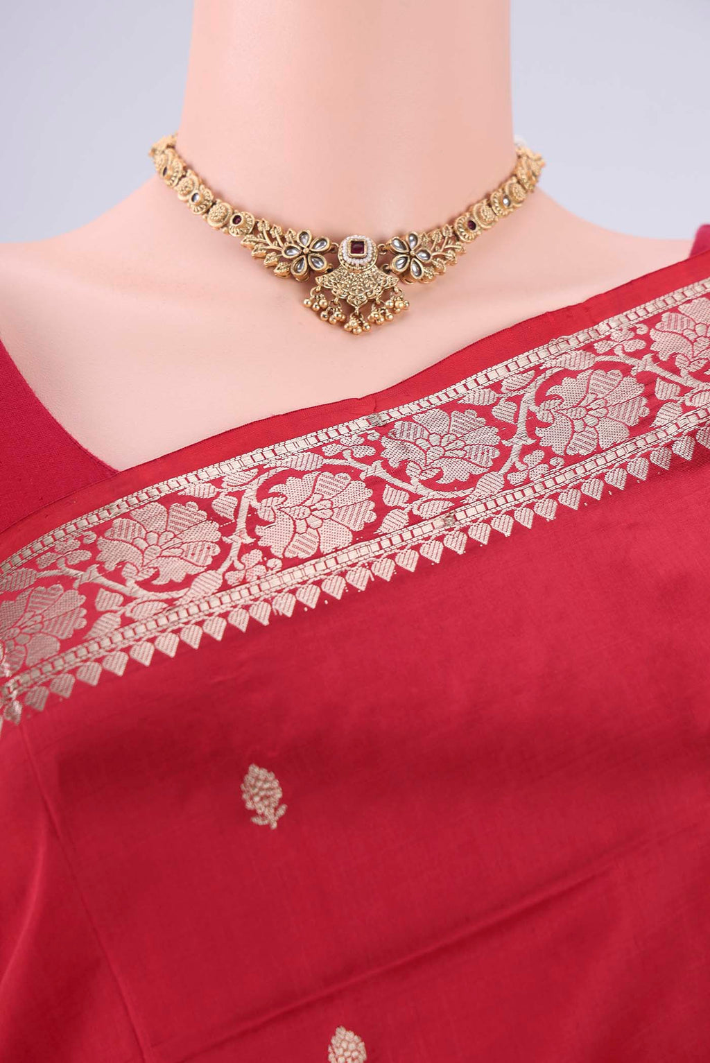 Border image of Maroon Banarasi Katan Silk Saree with Zari Butta on the body and Zari Border. 