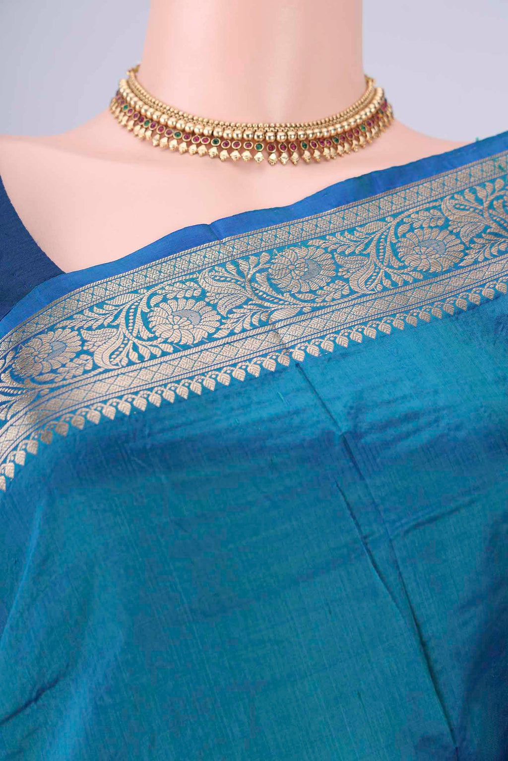 Border image of Peacock Blue Dual Tone Banarasi Katan Silk Saree with Zari Butta on the body and Zari Border. 