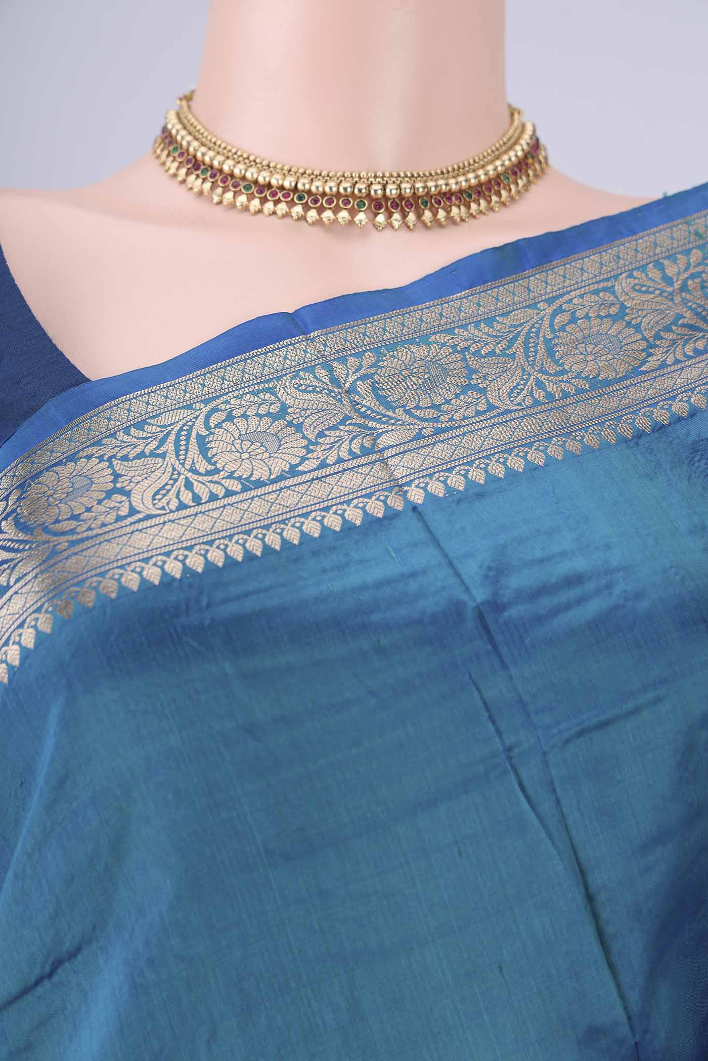 Border image of Peacock Blue Dual Tone Banarasi Katan Silk Saree with Zari Butta on the body and Zari Border. 