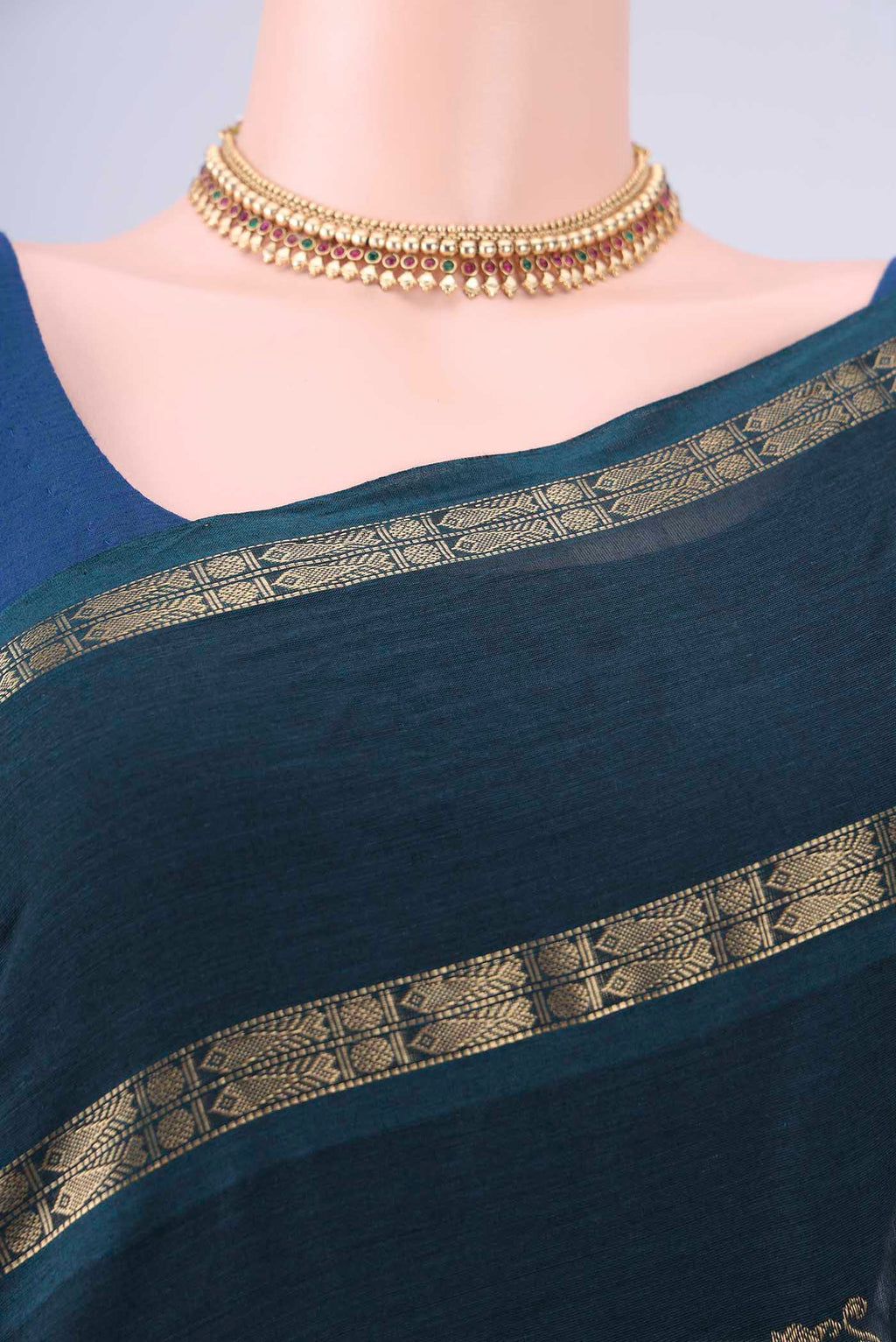 Border image of Teal Kanchi Cotton Saree with Zari Butta on the body and Zari Border. 