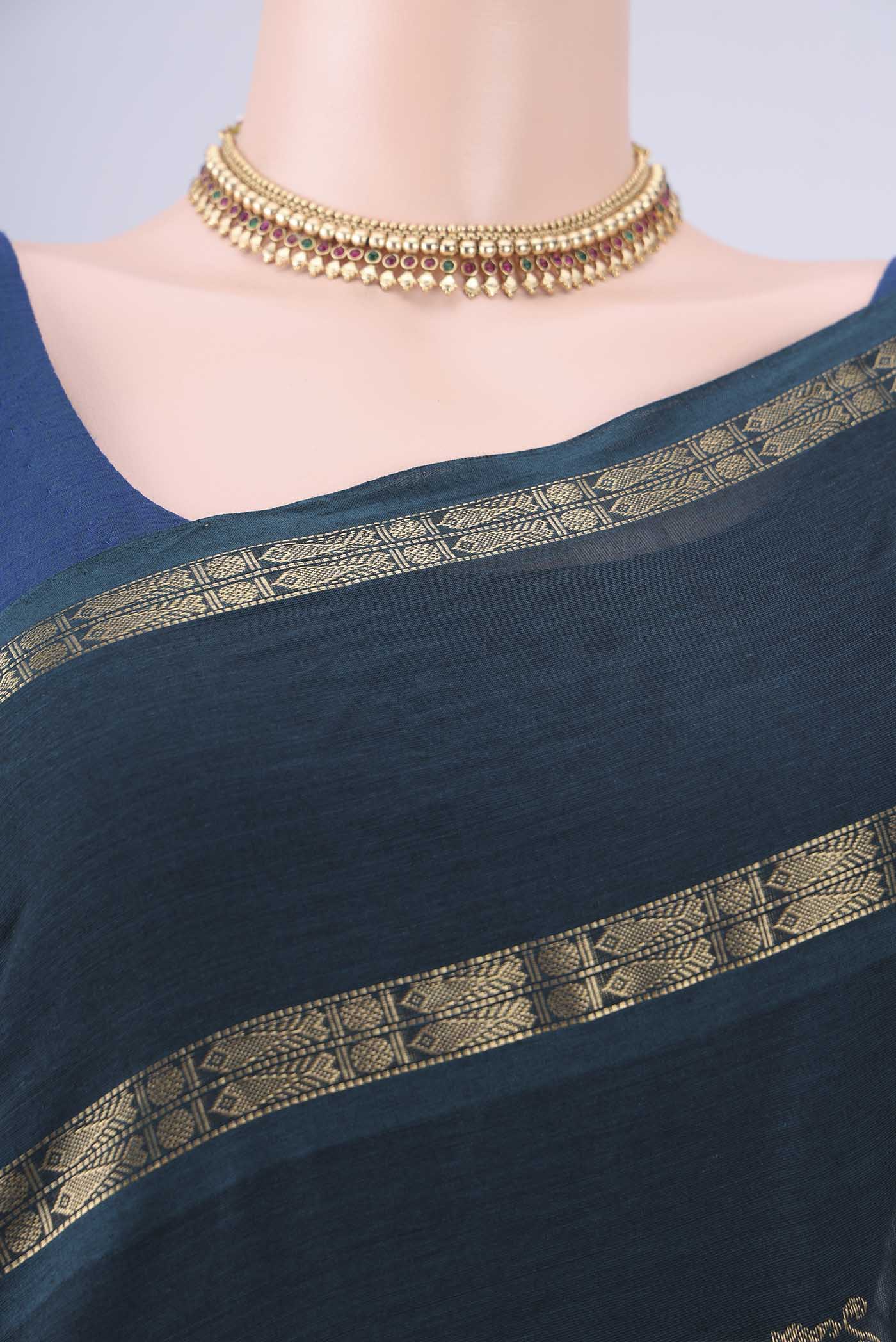 Border image of Teal Kanchi Cotton Saree with Zari Butta on the body and Zari Border. 