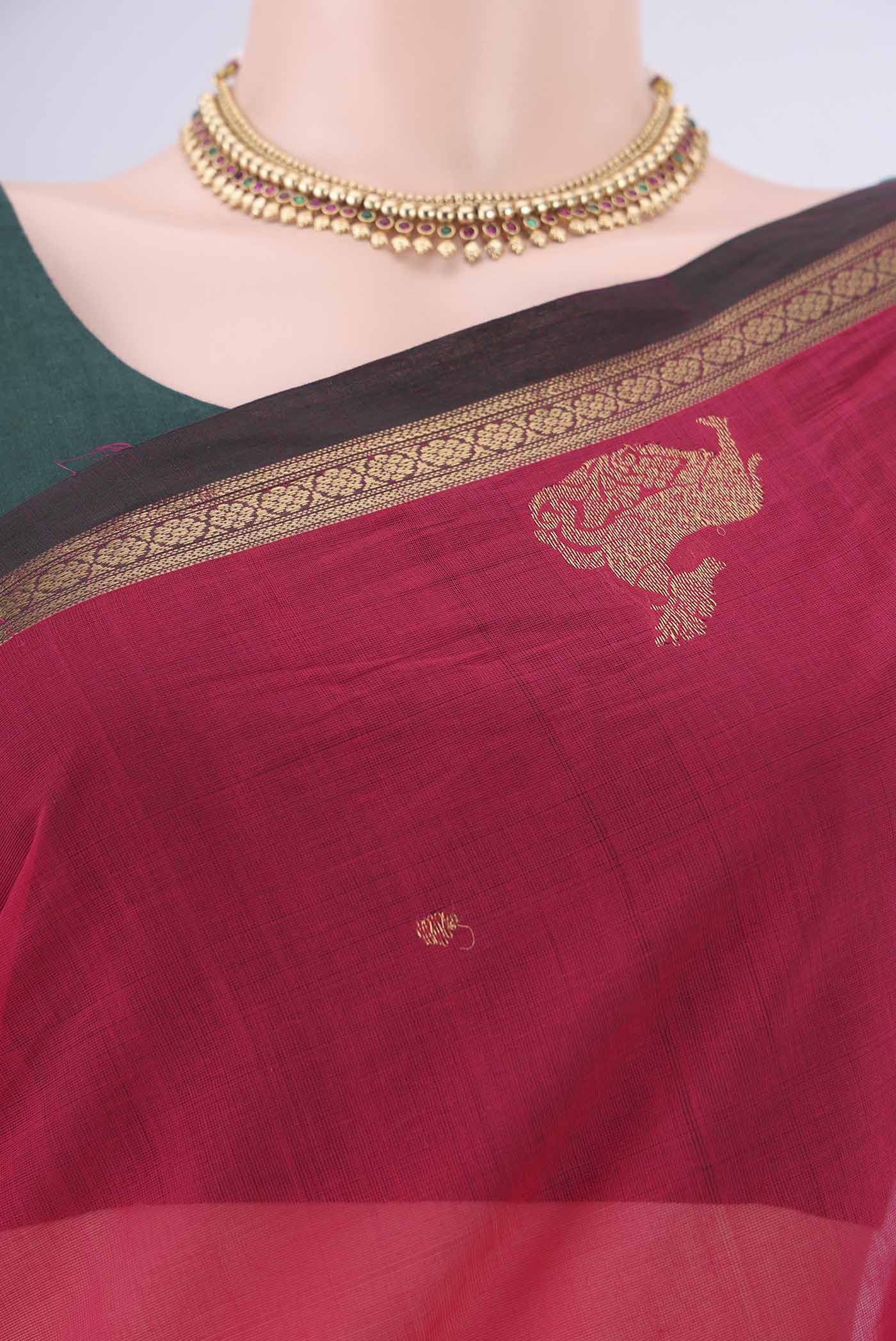 Border image of Pink Kanchi Cotton Saree with Zari Butta on the body and Plain Border. 