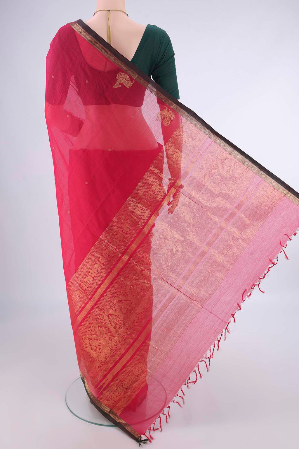 Flat view of Pink Kanchi Cotton Saree with Zari Butta on the body and Plain Border. 