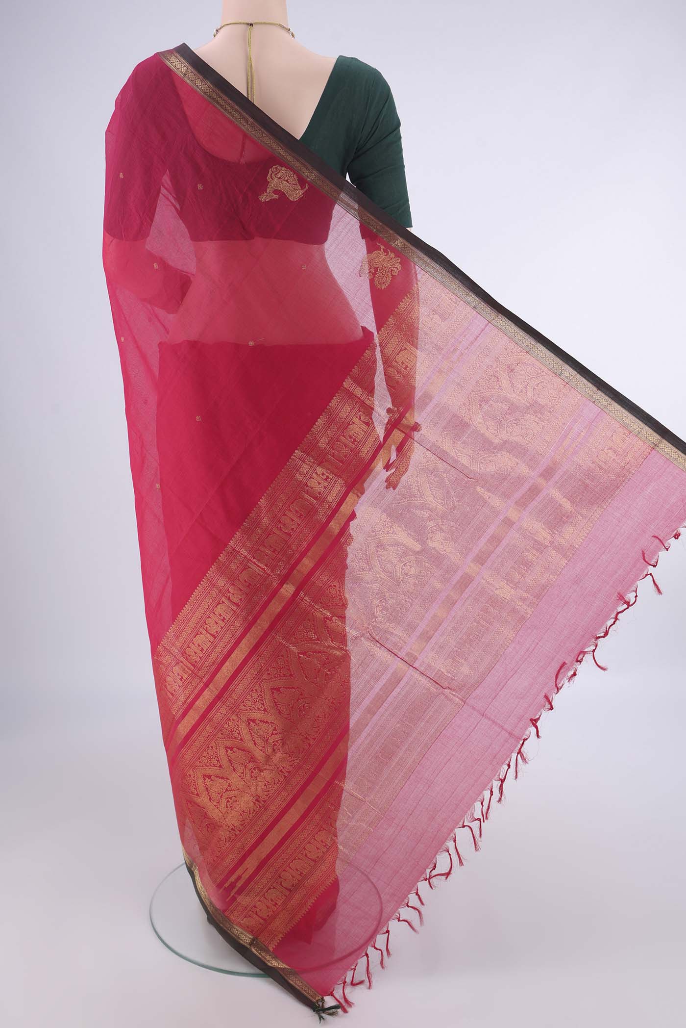 Flat view of Pink Kanchi Cotton Saree with Zari Butta on the body and Plain Border. 