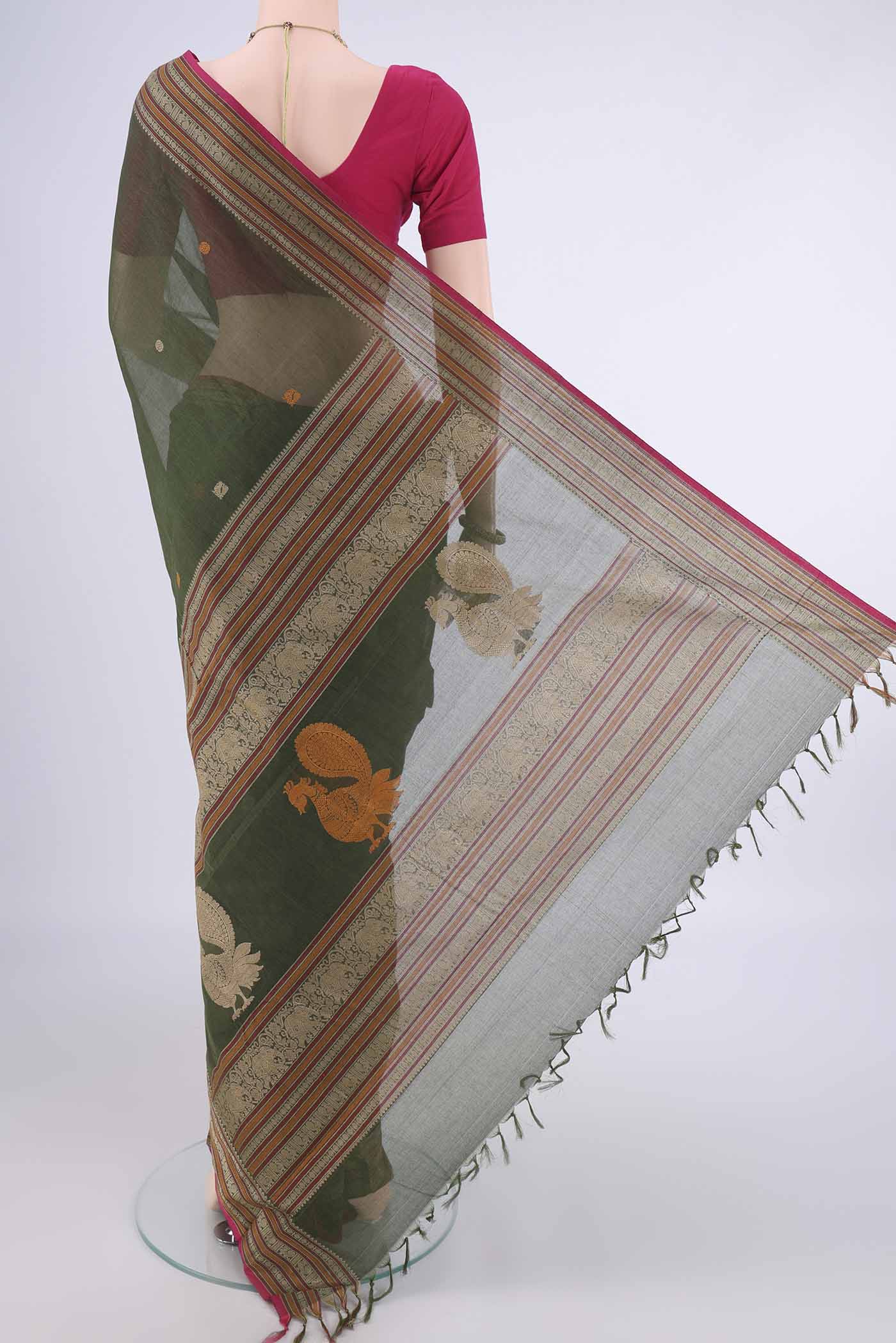 Flat view of Mehandi Green Kanchi Cotton Saree with Thread Butta on the body and Thread Border. 