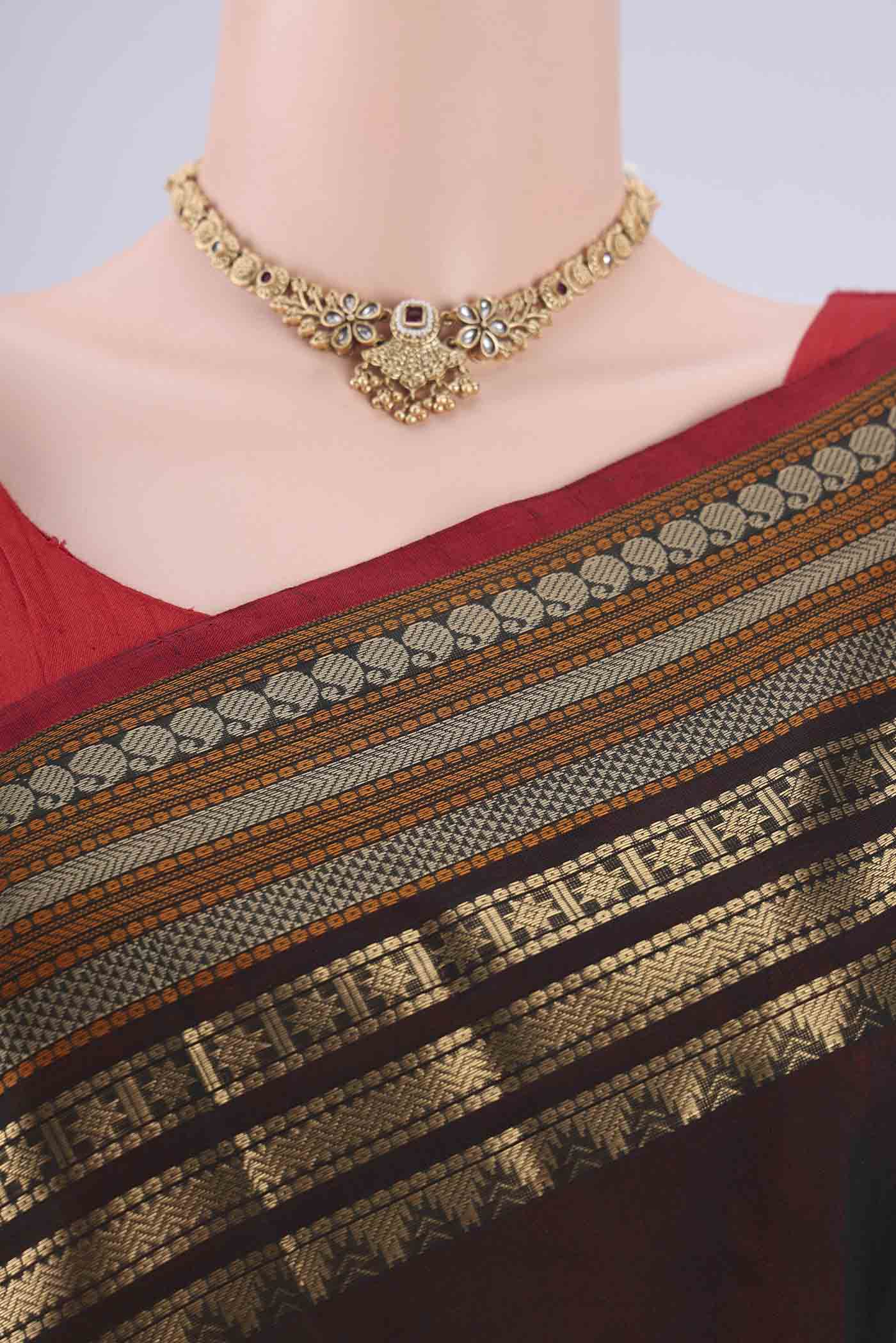 Border image of Bottle Green Kanchi Cotton Saree with Zari Butta on the body and Zari Border. 