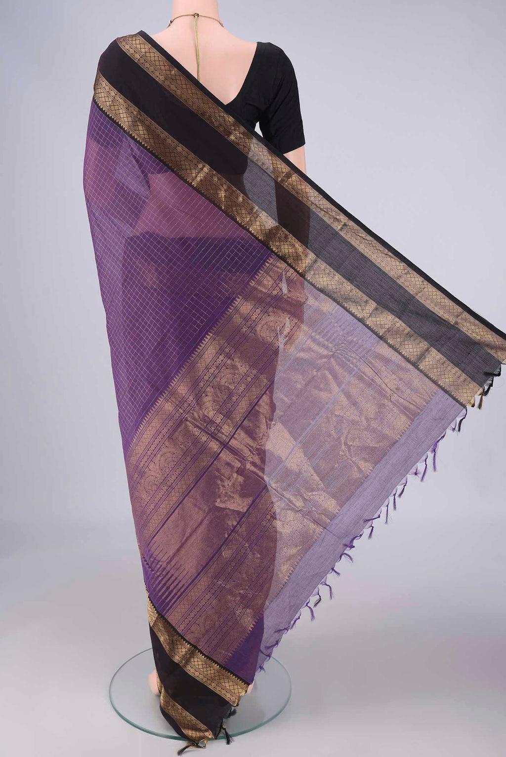 Flat view of Purple Kanchi Cotton Saree with Checked design on the body and Zari Border. 