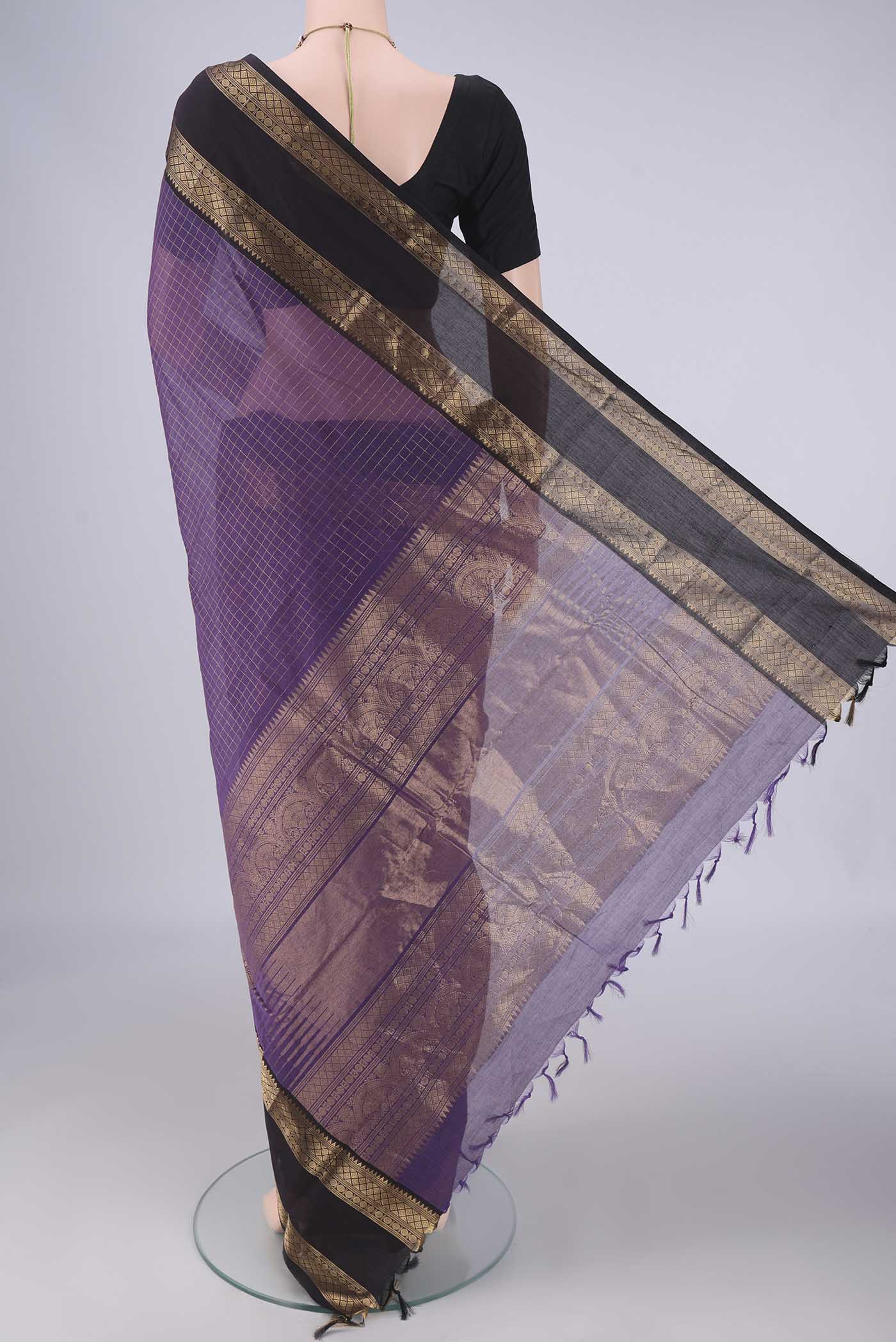 Flat view of Purple Kanchi Cotton Saree with Checked design on the body and Zari Border. 