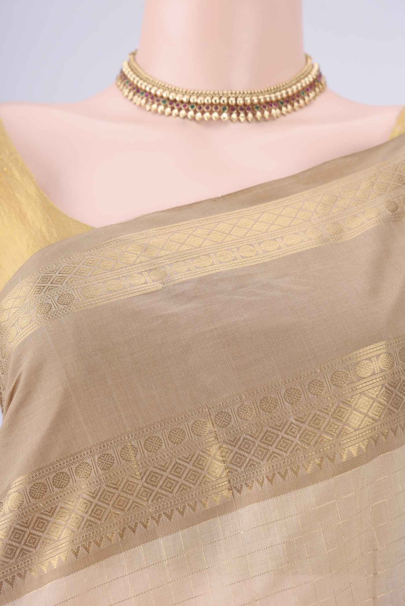 Border image of Cream Kanchi Cotton Saree with Checked design on the body and Zari Border. 