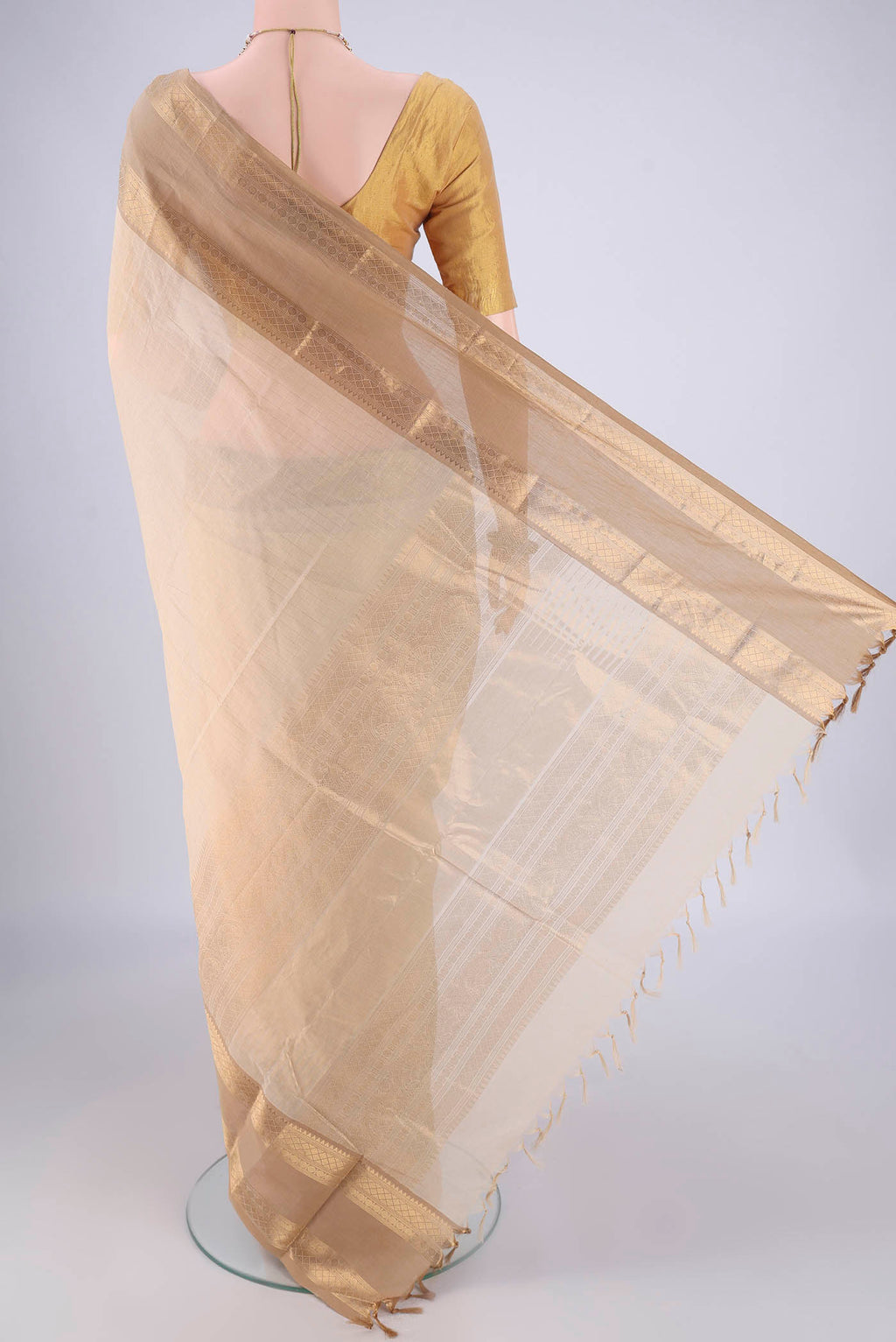 Flat view of Cream Kanchi Cotton Saree with Checked design on the body and Zari Border. 