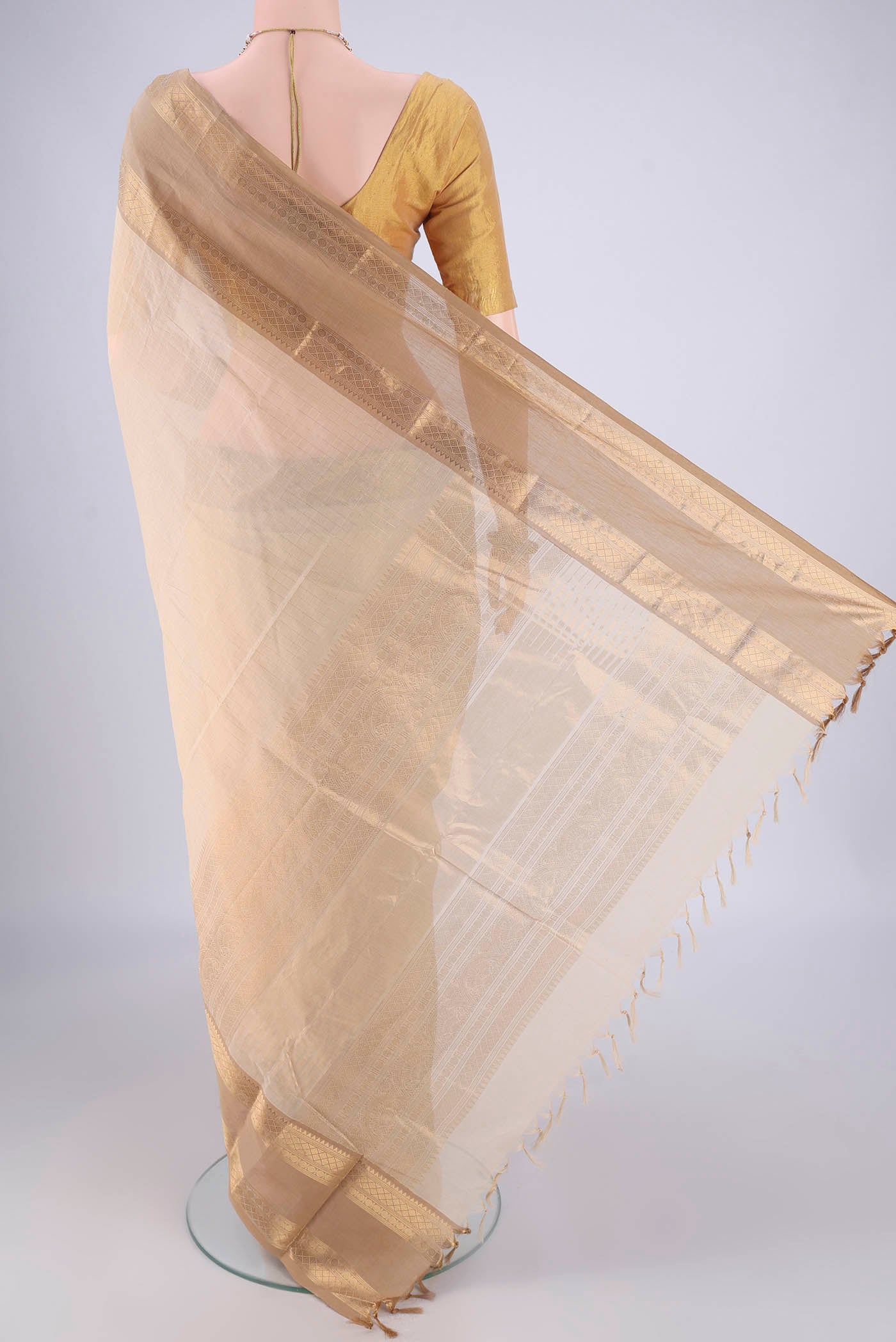 Flat view of Cream Kanchi Cotton Saree with Checked design on the body and Zari Border. 