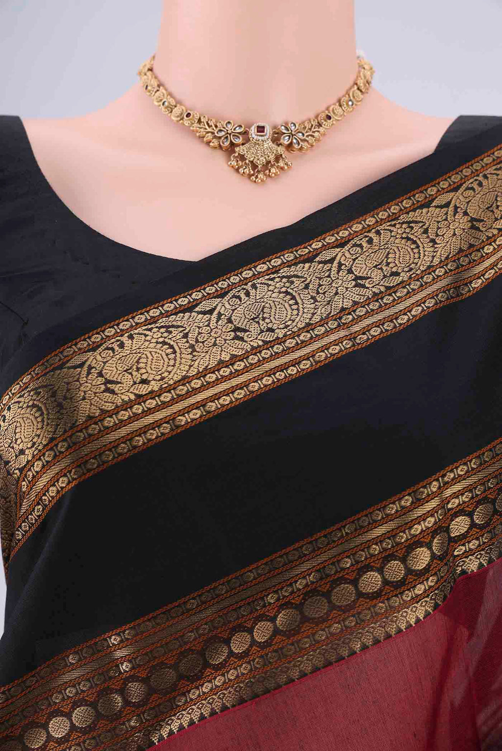 Border image of Maroon Kanchi Cotton Saree with Zari Butta on the body and Zari Border. 
