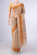 Sandal Kanchi Cotton Saree with Plain Body and Zari Border.  displayed on a mannequin