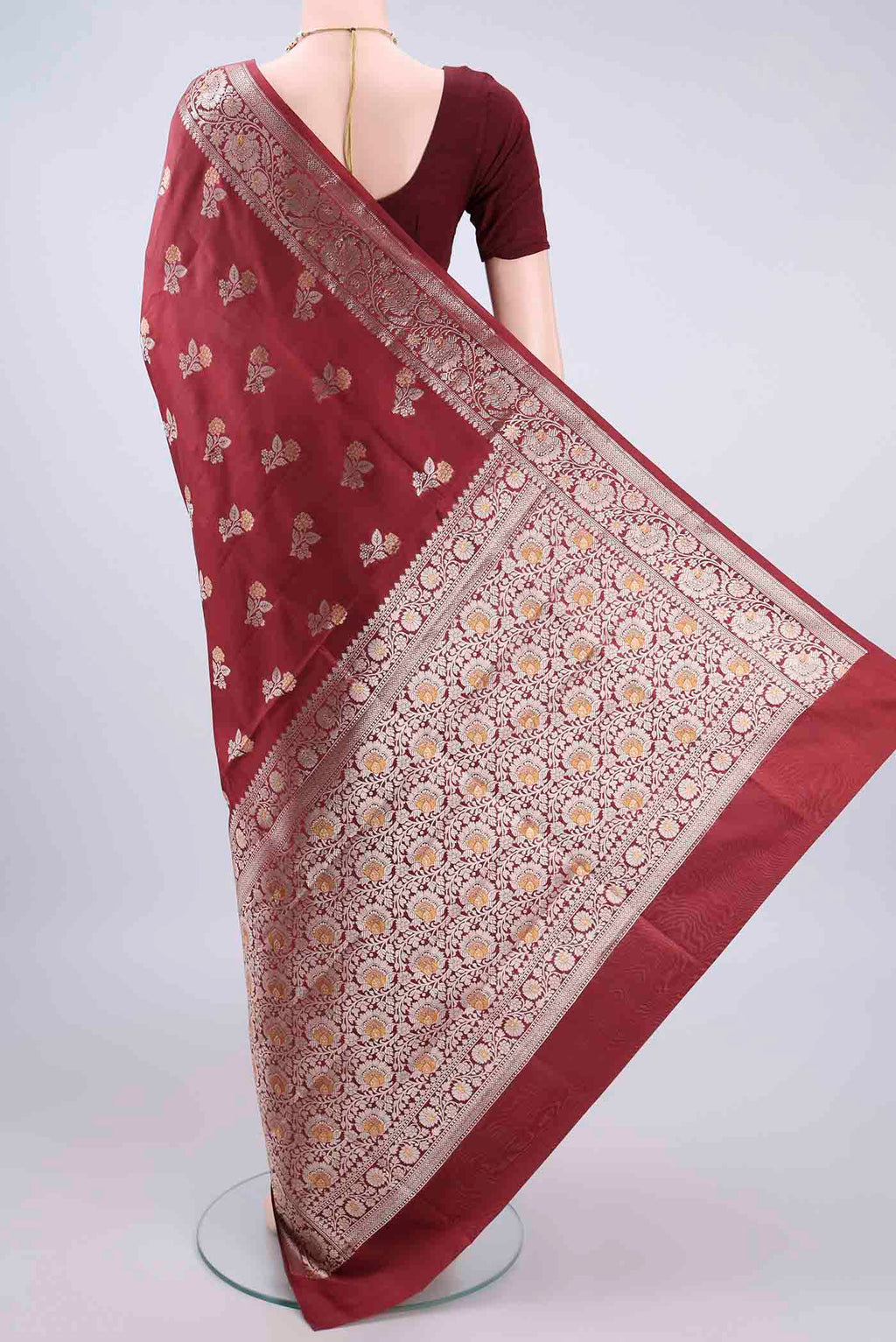 Flat view of Pure Silk Brown Banarasi Raw Saree with Zari And Thread Butta on the body and Zari Border. 