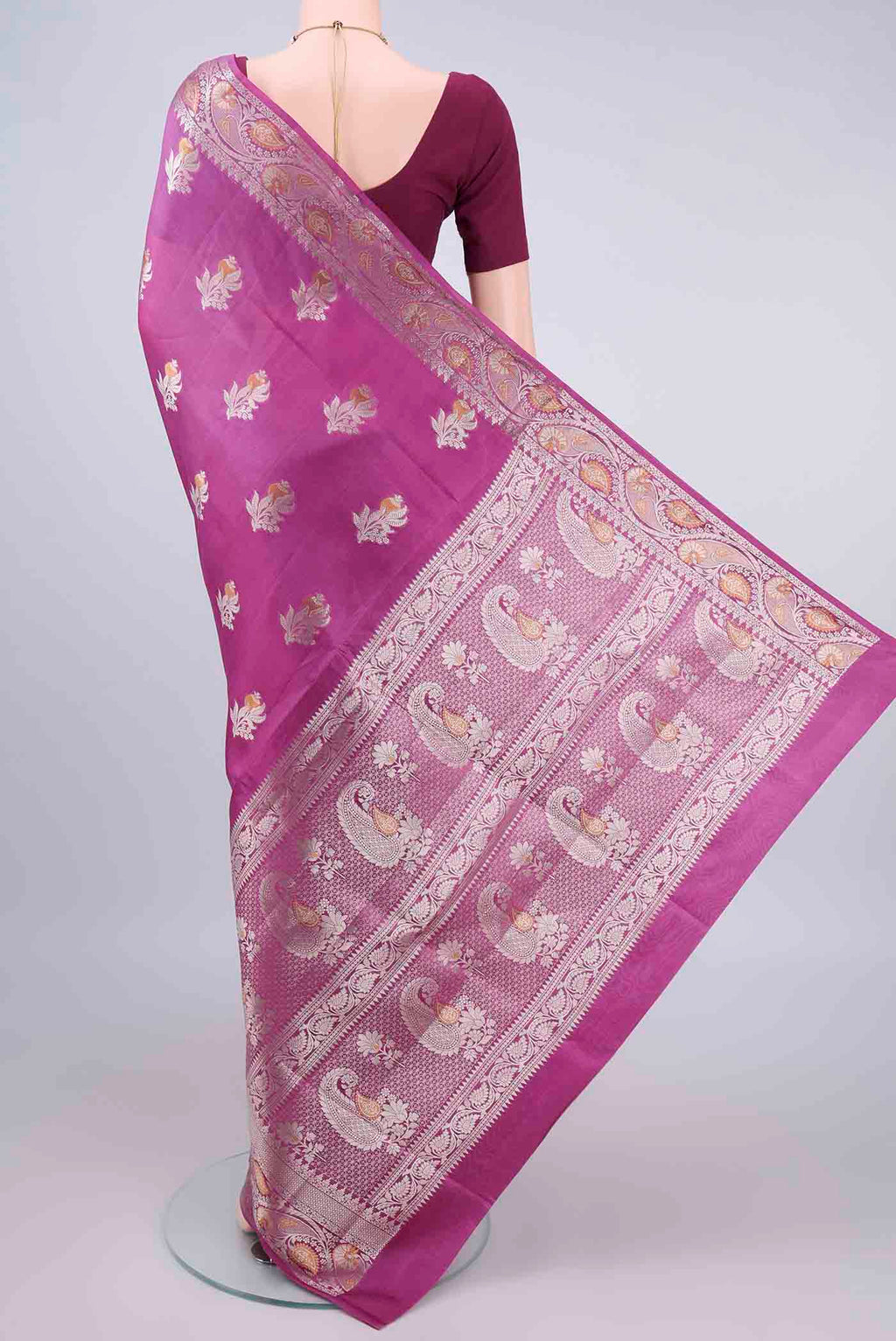 Flat view of Pure Silk Pink Banarasi Raw Saree with Zari And Thread Butta on the body and Zari Border. 