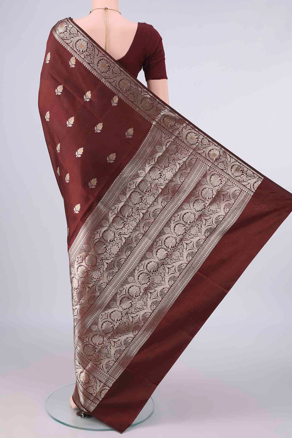 Flat view of Pure Silk Brown Banarasi Raw Saree with Zari Butta on the body and Zari Border. 